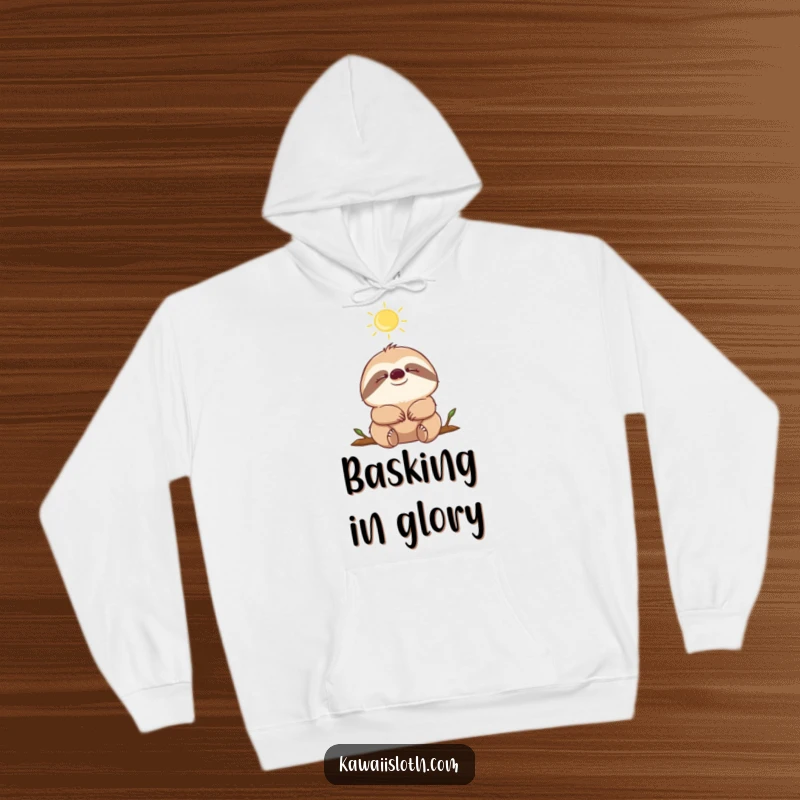 Funny sloth with closed eyes, soaking up a sunbeam, depicted on a warm, cozy hoodie, perfect for lounging.